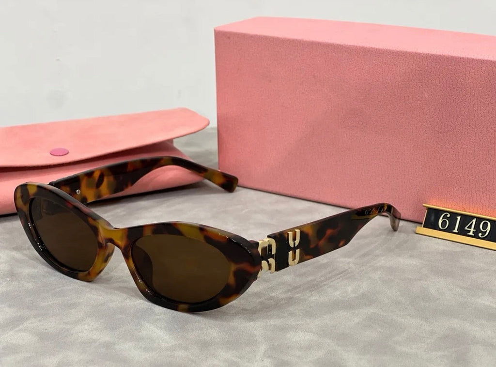Lunette de soleil femme :MIU MIU