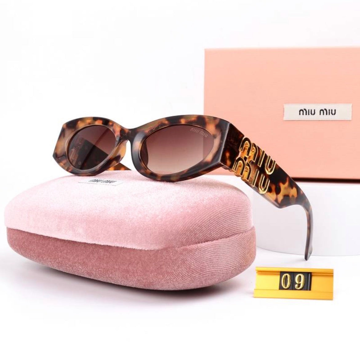 Lunette de soleil femme : MIU MUI